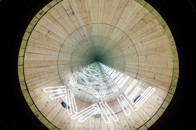 Illustration for article titled Neon Lights Make These NYC Water Towers Into Inter-Dimensional Portals